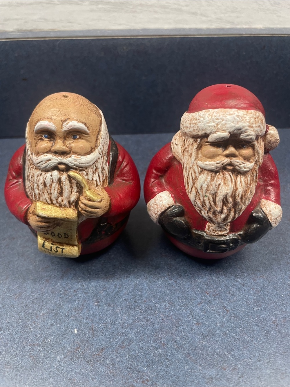 Festive Red Santa Figurine a set of two hand-painted Santa Claus
